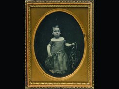 D125 - SMALL BOY IN CHECKED DRESS, TINTING