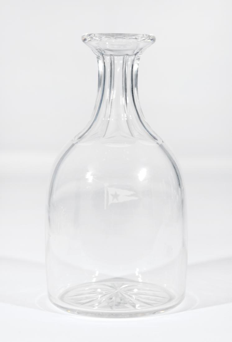 White Star Line Carafe: White Star Line carafe, circa 1910. The White Star Line flag is etched into the glass with some minor, shallow abrasions. Star-cut base and fluted neck. Dimensions: 9" tall In great condition. Very mi