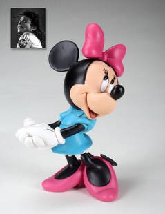 Statuette of Minnie Mouse, ex. Michael Jackson: Statuette of Minnie Mouse, ex. Michael Jackson. 10" x 8" x 6" (25.4 x 20 x 15 cm), brightly colored plastic statuette of the classic Disney character, Minnie Mouse. As "The King of Pop," Michael