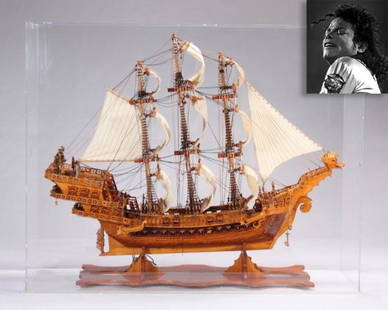 Jolly Roger, gift from Liz Taylor, ex. Michael Jackson: Jolly Roger, gift from Elizabeth Taylor, ex. Michael Jackson. Large scale wooden model of a three mast tall ship with three deck stern and canvas sales, 60" x 25" x 74" (154 x 66 x 190.5 cm) This