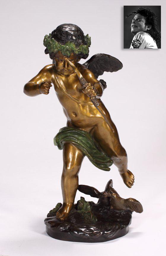 Eros, God of Love, Bronze, ex. Michael Jackson: Eros, God of Love, Bronze, ex. MIchael Jackson. Sculptor: Jean Antoine Houdon (French, 18th/19th Century), Cupid (or Eros, his Greek counterpart) bronze figure with colored patination, signed "Houdon.