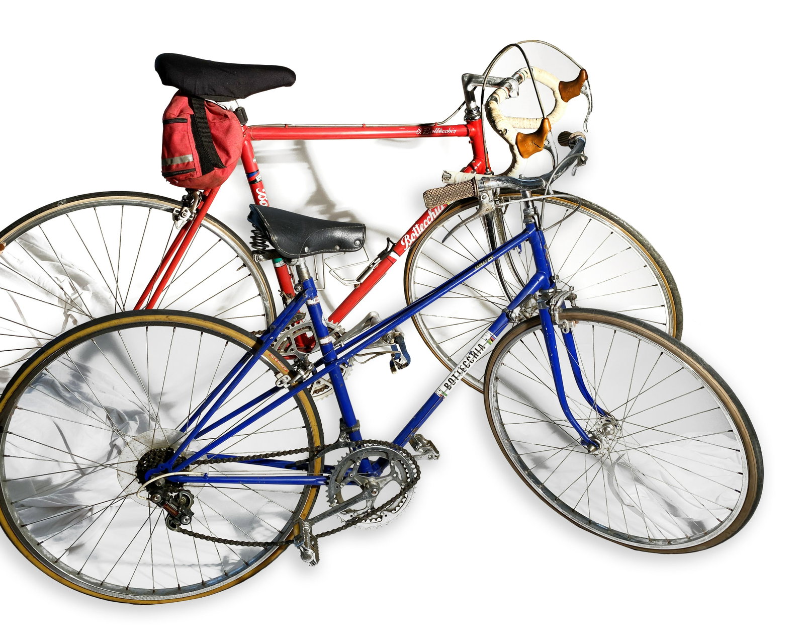 Red & Blue Bottecchia Man & Woman: Bottecchia Man and Woman's Racing Bicycles Blue Bottecchia woman's bicycle C. 1970s. The handlebars exhibit some surface rust and the bicycle needs a throrough cleaning, but to the best of our knowled