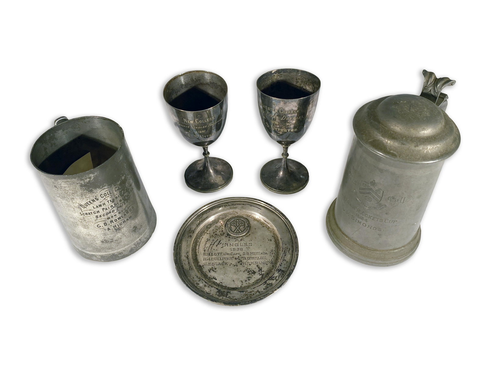 Tennis Trophies Ranging in Years from 1883 to 1938: Tennis Trophies Ranging in Years from 1883 to 1938 Five (5) tennis trophies including 1938 Singles Championship at the Philadelphia Interclub, the Wigram Racket Cup 1934, Queens College 1883, Winchest