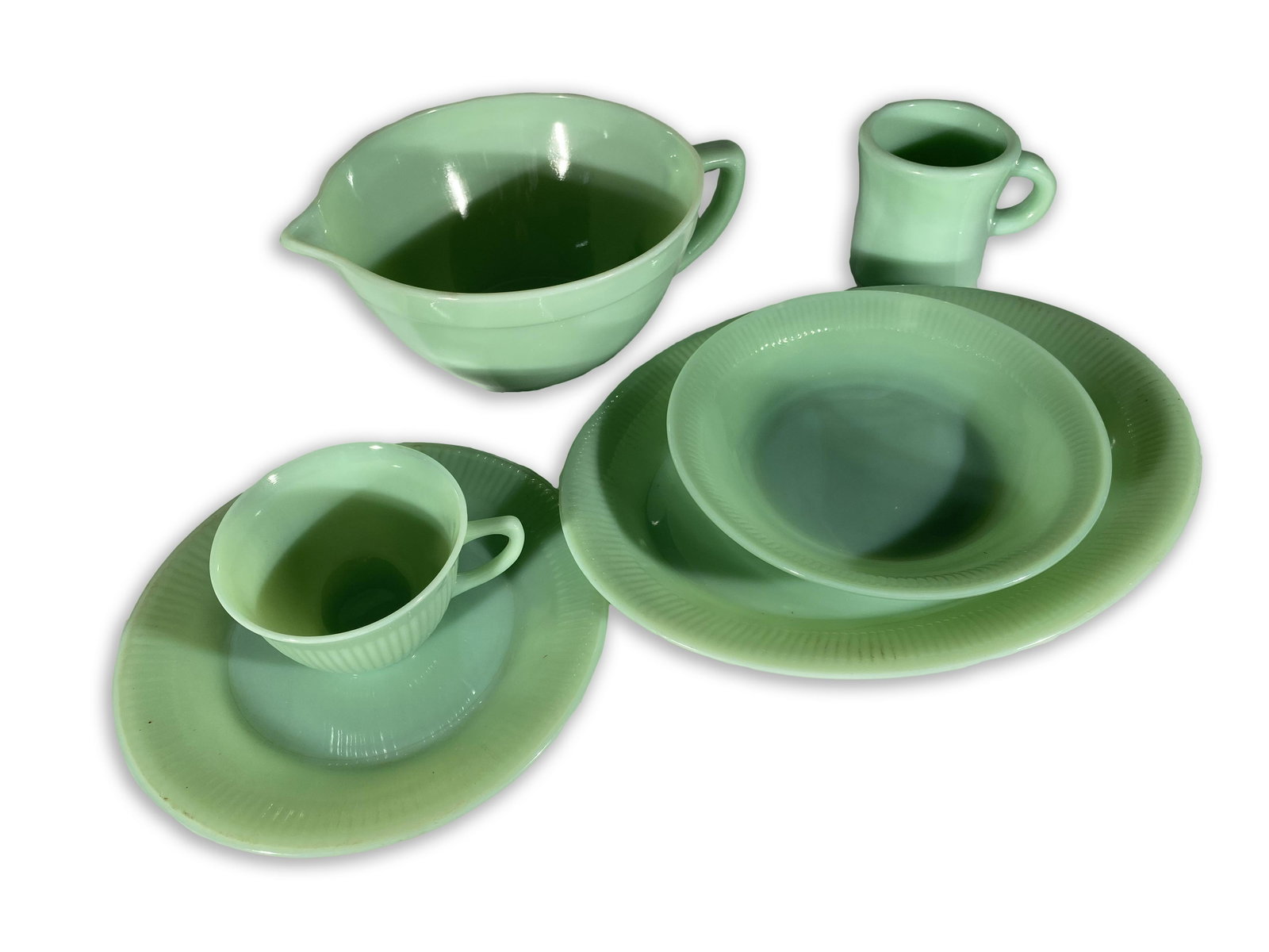 Forty-Nine-Piece Fire-King Ovenware Collection: Fire-King Ovenware (Jadeite) Forty-Nine (49) Piece Collection This collection consists of one (1) handled mixing bowl, ten (10) dinner plates, one (1) oval platter, four (4) soup bowls, six (6) coffee