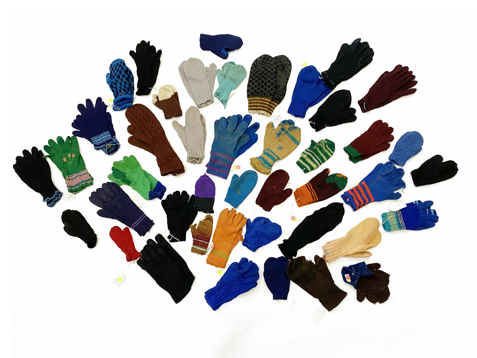 Collection of 43 Pairs Antique Amish Mittens and Gloves: About Forty-three (43) Antique Amish Mitten and Glove Collection Many of the handmade items in this collection are identified to the community where they were made, while many have old repairs, often 