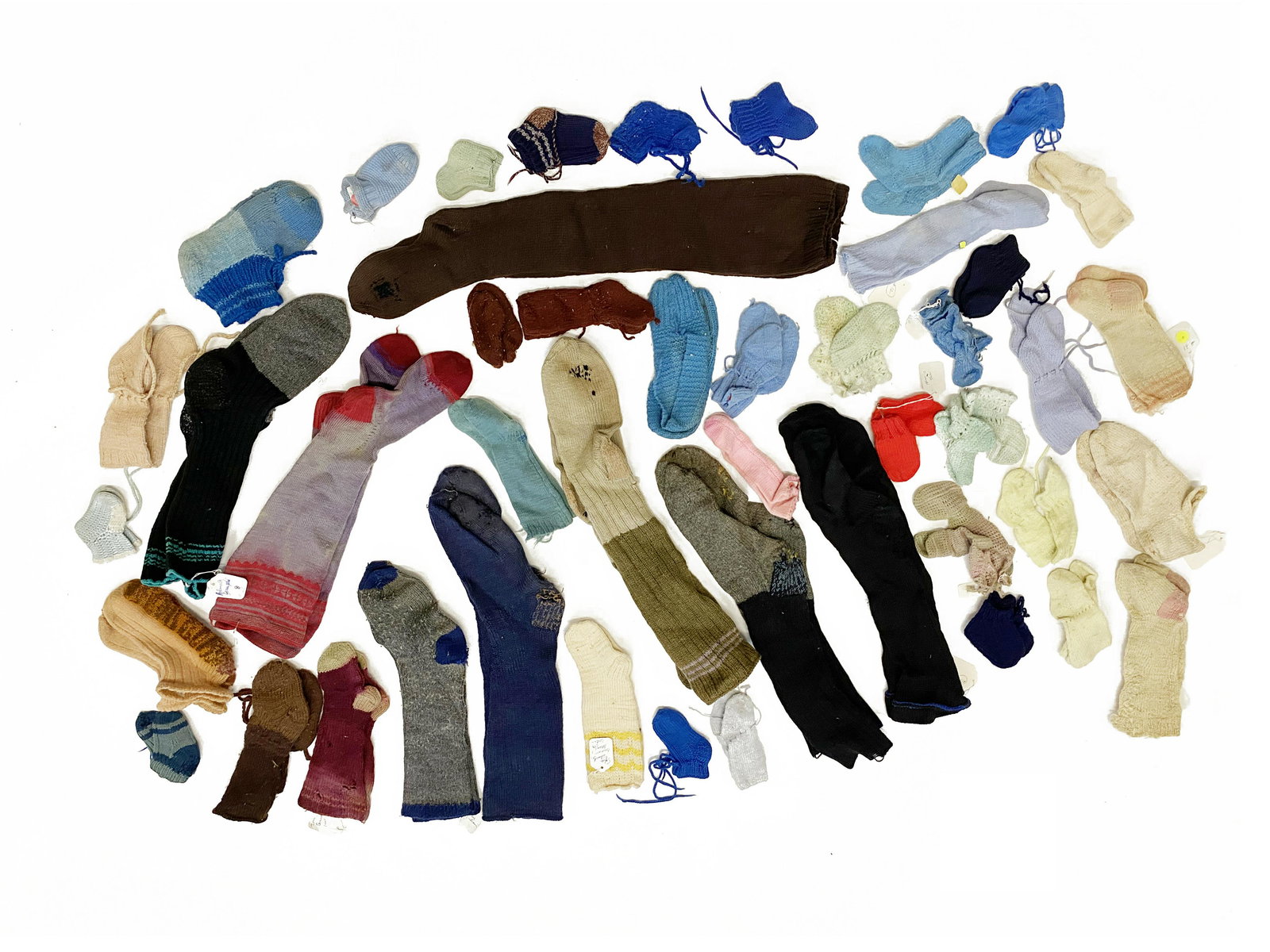 Collection of 46 Antique Amish Handknit Socks & Booties: Approximately Forty-six (46) pairs Antique Amish Handknit Sock and Bootie Collection A museum quality assemblage of handmade Amish items dating back to the early part of the 20th Century, if not earli