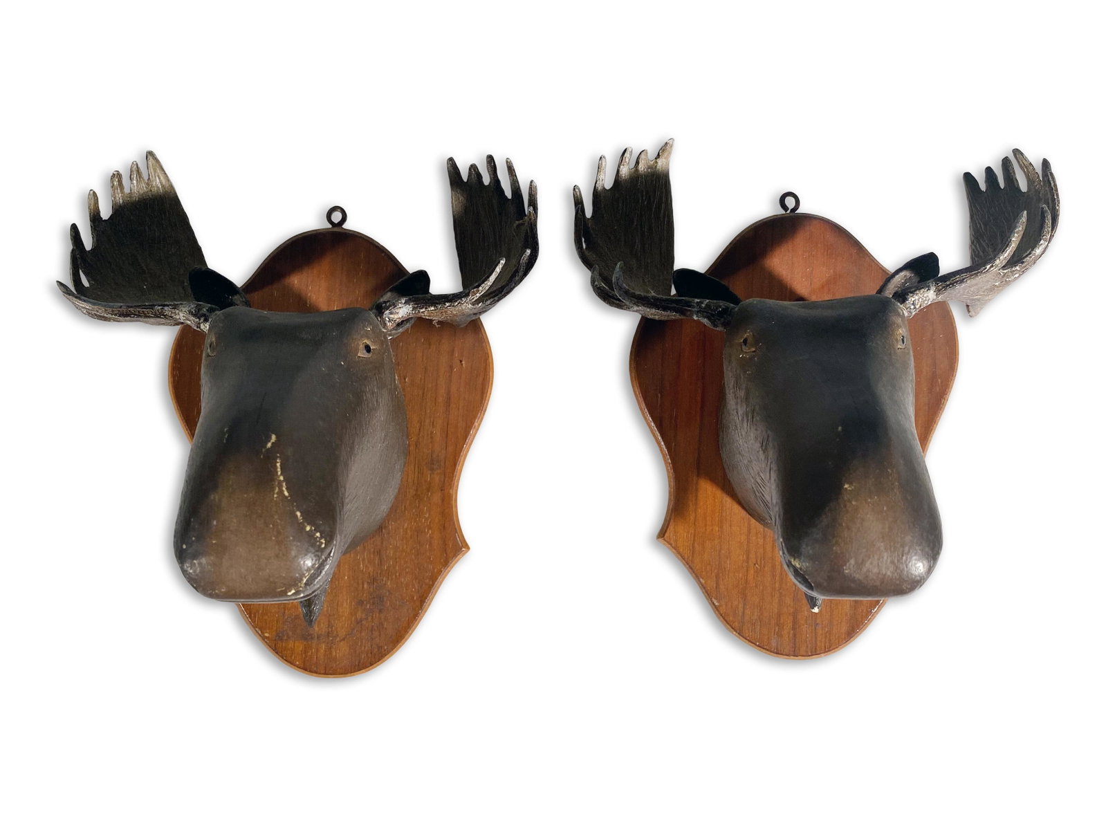 Pair of Miniature Moose Heads on Wooden Plaques: Vintage Pair of Miniature Moose Heads on Wooden Plaques Very charming. 7.5" tall This is an unreserved auction with no minimums. This is an online only sale. Items may be viewed upon appointment in Ne