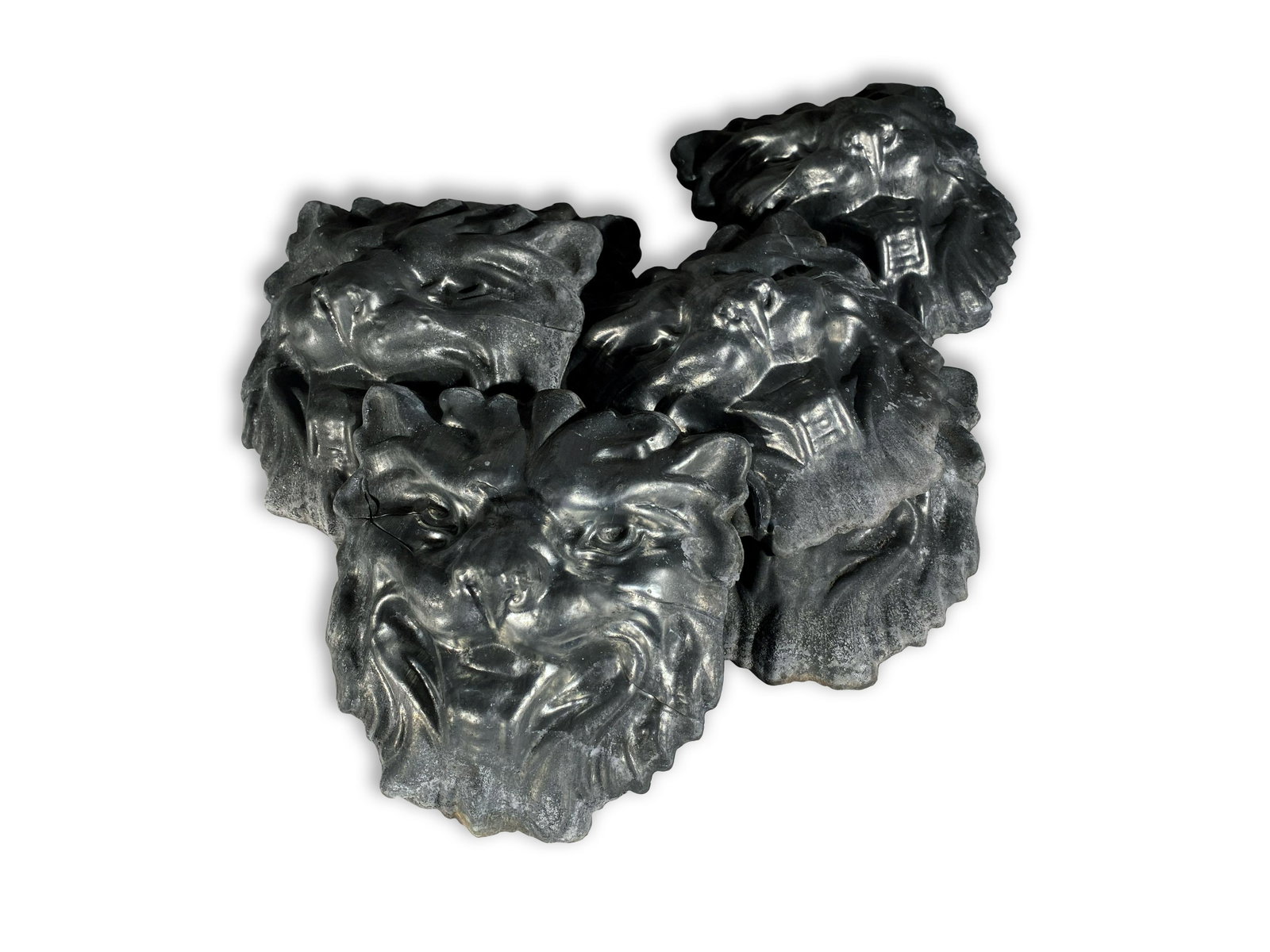 Nine Zinc Three-Dimensional Architectural Lion Heads: Nine (9) Zinc Three-Dimensional Architectural Lion Heads In the mid 1980s, a major auction was conducted of the work of Kenneth Lynch of Wilton, CT. Lynch had been well known for his metalwork that ra