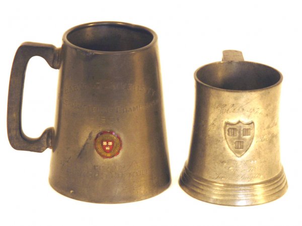 Two Early Harvard Trophy Mugs Belonging to James D: Two early Harvard trophies: 1) Glass-bottomed pewter mug inscribed "Class [of] 1874, Golf Competition, Medal Handicap, June 27, 1899, Souvenir, James Dwight" with a Harvard crest. 2) Glass-bottomed pe