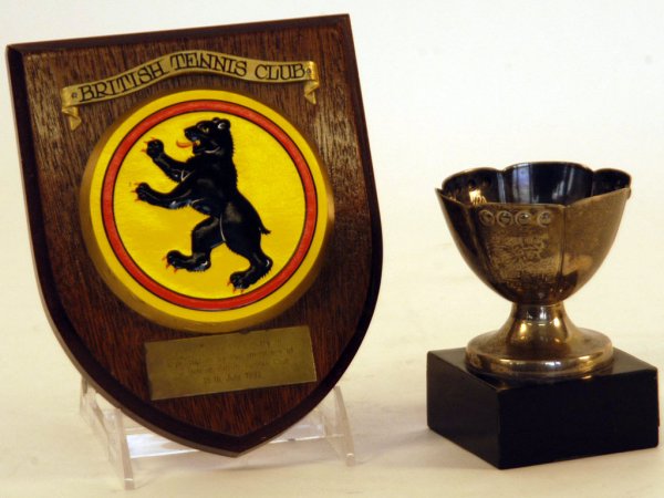 Two International Awards: Two international awards: 1) Painted wood plaque "British Berlin Tennis Club Appreciation: given to Fred Perry in 1992, 5"; 2) Sterling silver cup, "XV Torneo Panamericano de Tenis, Mexico 1956", awar