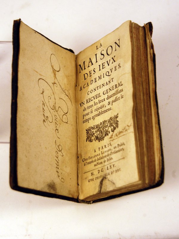 Maison des Jeux Academique', 1665 Edition : The 1665 edition of the book 'Maison des Jeux Academique' first published in 1599 by Forbet. Contains 20-page chapter on "Le jeu Royal de la Paume"; the first part discusses various theories as to why