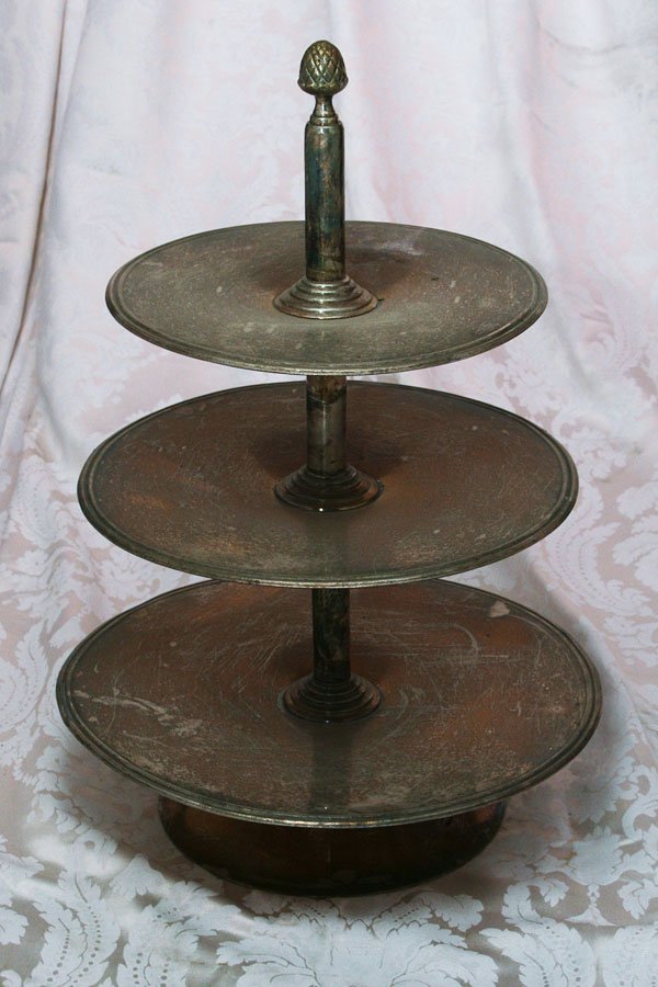 Three-Tiered Cake Stand with Acorn Finial: Silverplate three-tiered cake stand with an acorn finial. Approx. H28"