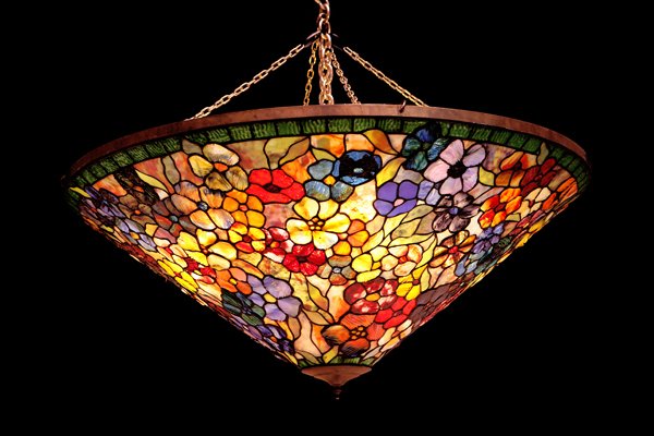 Art Nouveau-Style Tiffany Glass Hanging Lamp: Art Nouveau-style leaded glass ceiling lamp crafted from Tiffany workshop glass, including square frogs' back jewels, opalescent glass, and marbleized glass. Predominant colors are red, blue, purple a