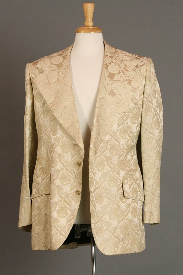 Champagne-Colored Tavern Tablecloth Suit: Suit made from a golden champagne-colored woven brocade Tavern on the Green tablecloth. Custom for Warner LeRoy by Fiorvani.