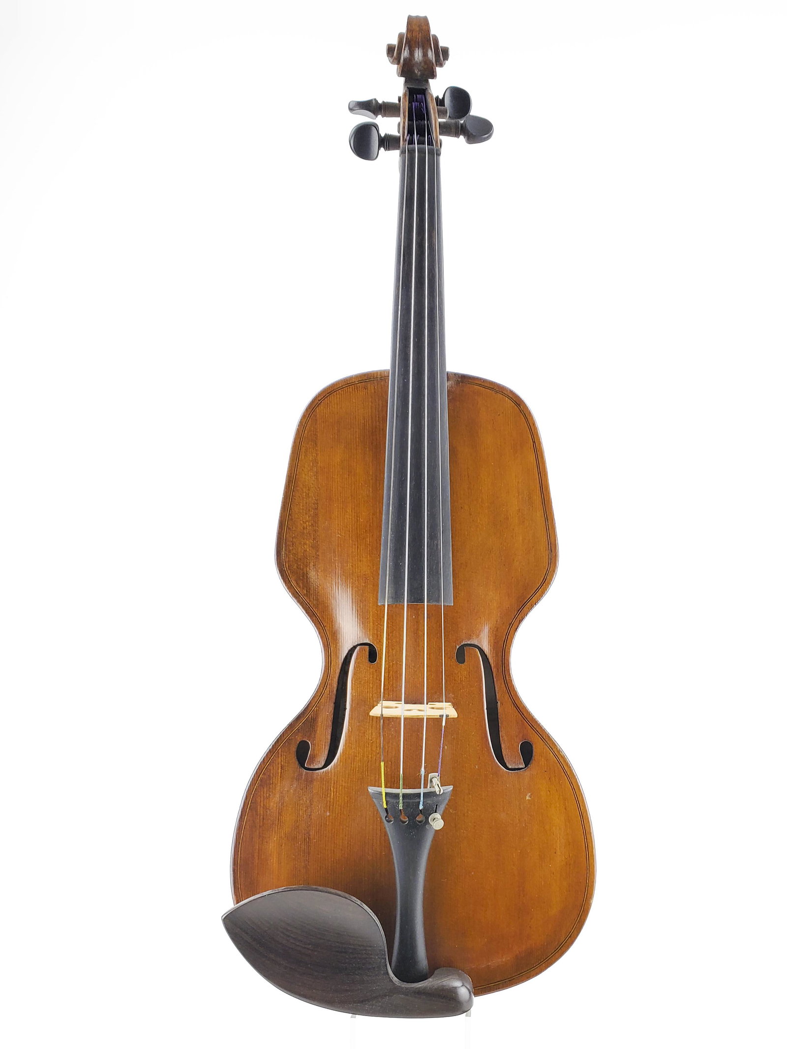 Rettburg and Lange Violin: Rettburg and Lange Violin In 1897 Messrs Rettburg and Lange took over the factory and banjo making plant of J H Buckbee and established a factory at 383 Second Avenue, New York City. By 1903 they had 