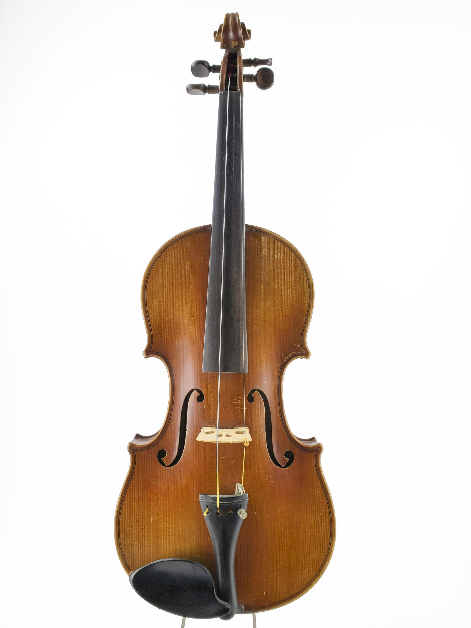Violin Bearing Facsimile Label: Violin Bearing Facsimile Label Labeled, "Fini Sous la direction de. Caressa & Francais Luthiers du Conservatoire 12 Rue de Madrid a Paris." LOB 35.9cm. The Meisel Collection. This instrument is being