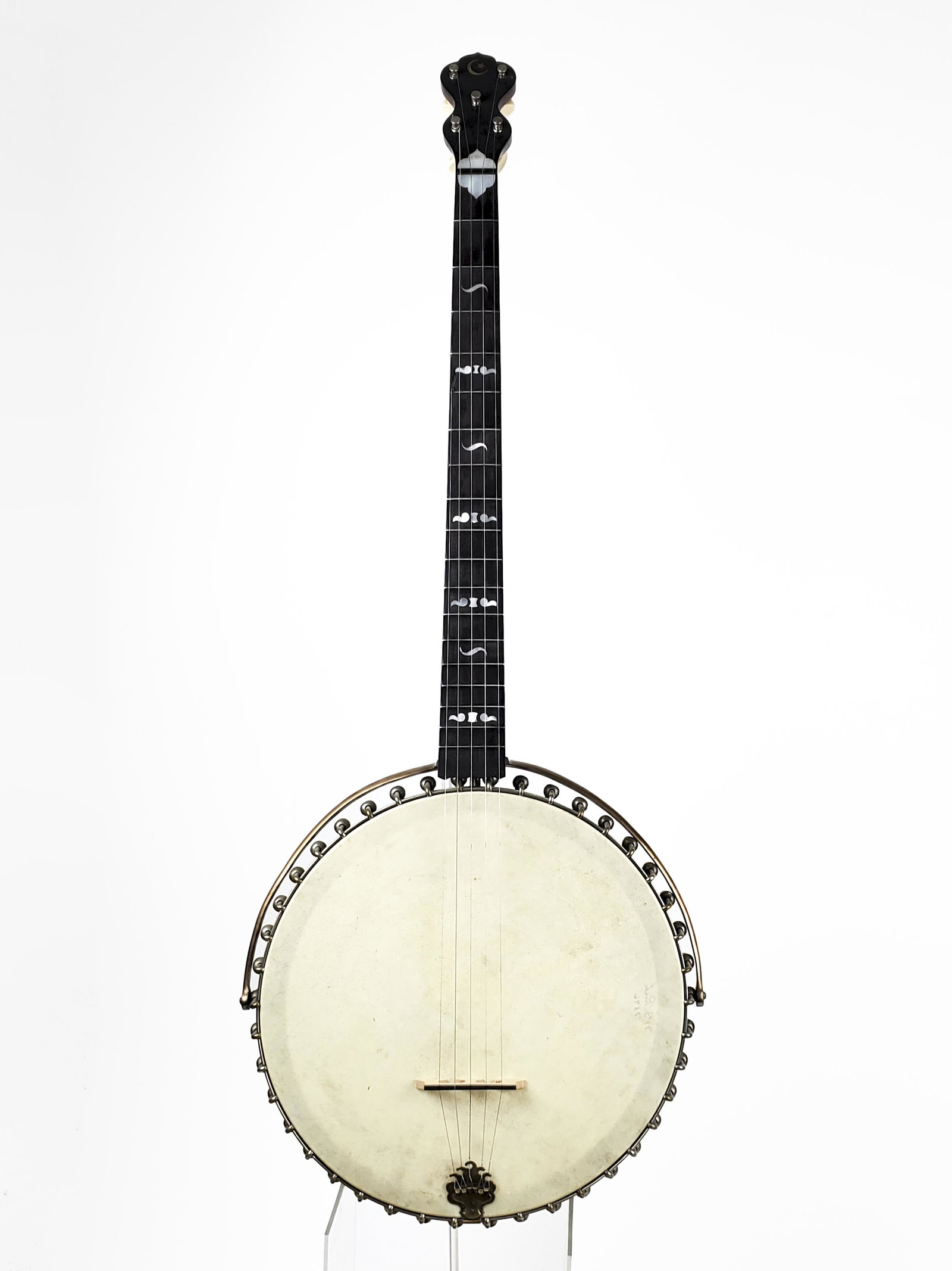 Lion Banjo Manufacturing Co. Banjo, 1896: Lion Banjo Manufacturing Co. Banjo Signed W.B. Park, 1896. Made in Rock Rapids, Iowa. Height 88cm. Piccolo banjo with rip in skin head, c.1998. Length: 59cm. The diameter of the skin head is 7.75" and
