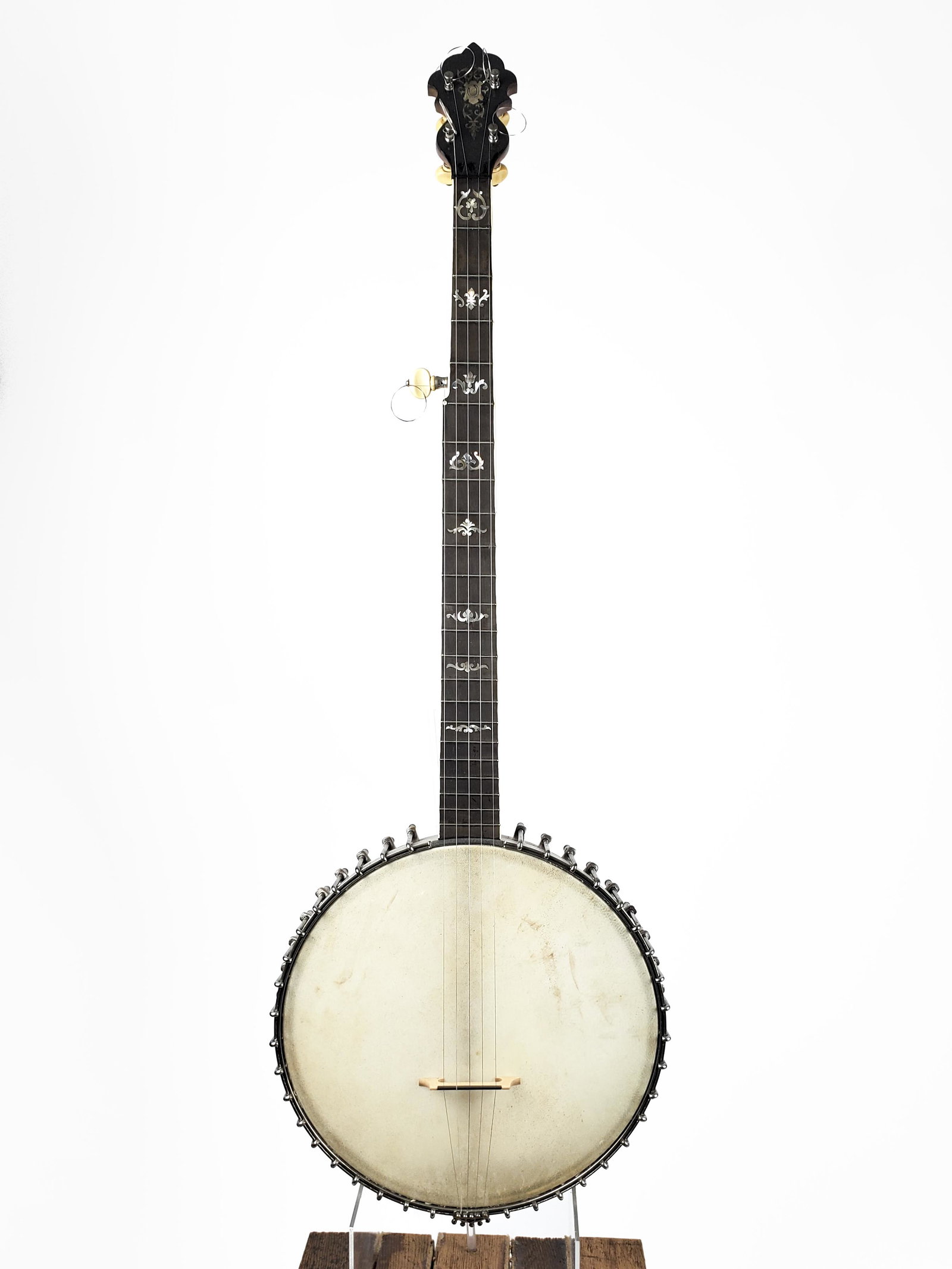 Banjo: Banjo Fancy inlays on headstock and neck. Heavy metal-clad inside and full spun over rim. Height 91cm. The Meisel Collection. This instrument is being sold from The Meisel Collection assembled over a 