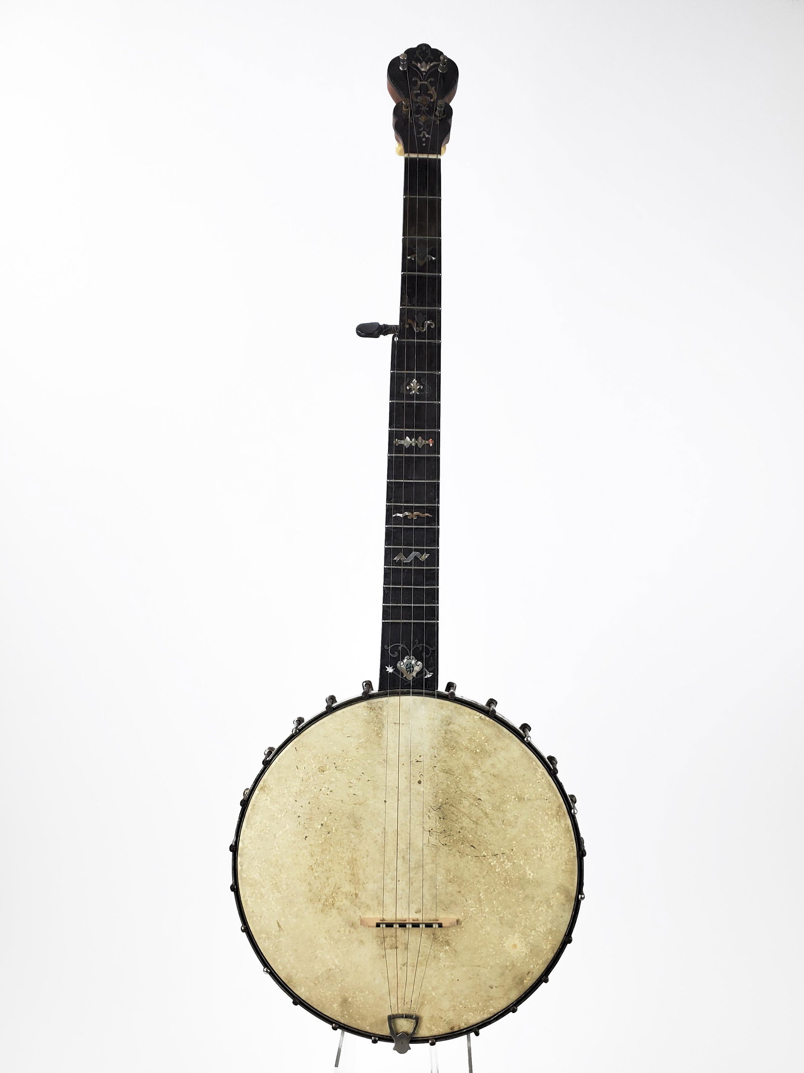 Banjo: Banjo Nicely inlaid commercial banjo. Cracks to veneer and head. Height. 89cm. The Meisel Collection. This instrument is being sold from The Meisel Collection assembled over a period of forty years by