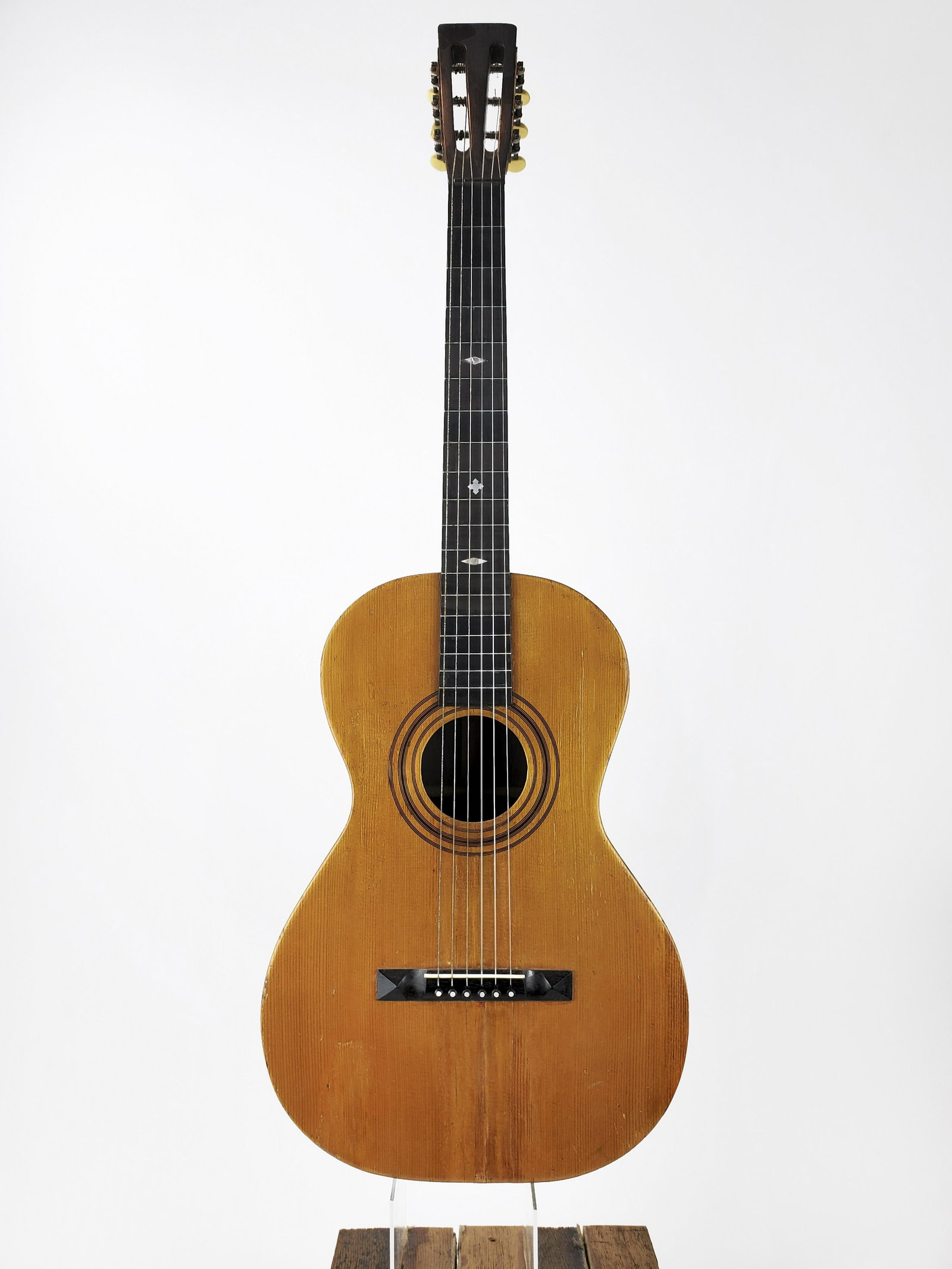 Lion Banjo Co Guitar: Lion Banjo Manufacturing Co Guitar Rock Rapids, IA. An elegant classically designed instrument. Repaired cracks on the soundboard. Hairline cracks on the back. Height: 96cm. In the 1890s a five-string