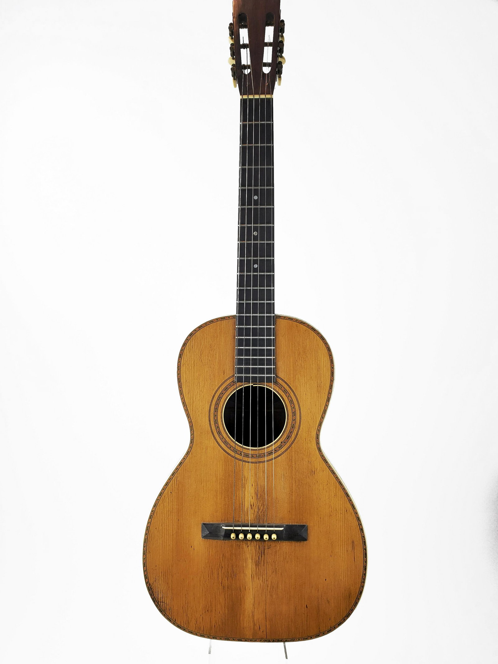 John C. Haynes Co Guitar, "Bay State": John C. Haynes Company Guitar "Bay State." John C Haynes - Boston, C.H Ditson - New York, J.E. Ditson - Philadelphia. Two hairline cracks from lower bout to bridge. Height: 97cm. A handsome insturment
