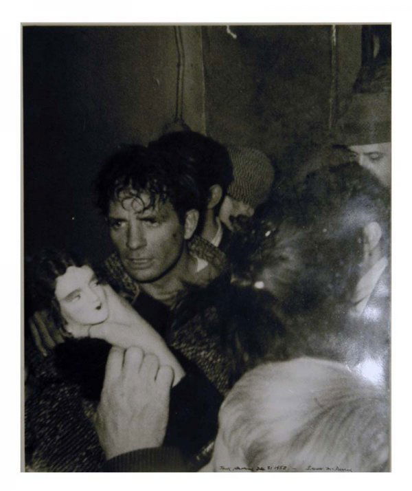 Vintage Photo of Jack Kerouac by Fred W. McDarrah: Jack Kerouac at the Artists Club, New Years Eve, December 31st 1958", by Fred W. McDarrah. On the bottom right of the photo hand signed is "Jack Kerouac Dec 31st, 1958 -- Fred W. McDarrah" in McDarrah