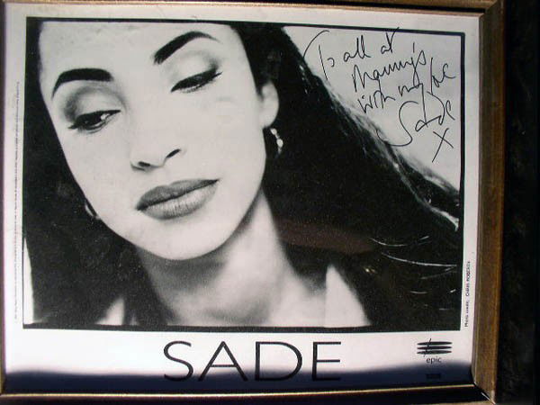 Marc Anthony, Sade: Two images of Marc Anthony and Sade. 8X10'' B/W images. Inscriptions read:"Manny's Thanks 1,000,000 stay #1" and "To all at Manny's with my love"