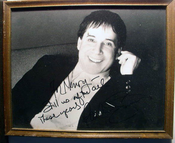 Paul Simon, Billy Joel: Two images of Paul Simon, Billy Joel. 8X10'' B/W images. Inscriptions read: "To Manny's-Relax!" and "For Henry still us after all these years"