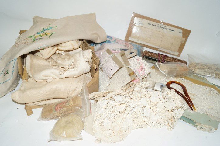 Mercantile Lot: The lot includes 23 cards of lace and trim; buttons; ornamental hair pin; 2 crocheted baby dress tops; 1 lace dress top; 1 cloth dress top; 1 cloth dress collar; crochet cross book mark; 1 ball of moh