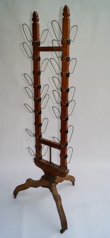 Oak Shoe Store Display Rack: Marshal, Field & Co., Chicago. Gem brand, patented Feb. 22, '87. On tri-footed wheeled base. 74" high