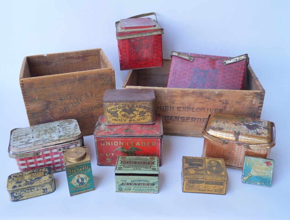 Large Lot of Tobacco Related Advertising Tins: Eleven tins in two wooden advertising crates. Included are two Tiger Chewing Tobacco handled tins; The Richmond Mixture for Smoking, No. 1, Allen & Ginter Richmond, Virginia; Benton Mixture Smoking To