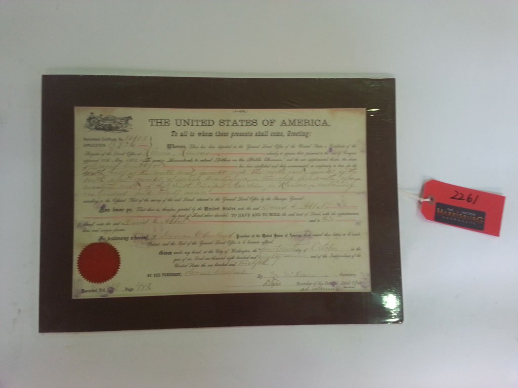 Certificate Signed Grover Cleveland: Homestead Certificate for Kansas land tract with a signature of Grover Cleveland, perhaps by M. McKearn, Secretary 9" H. x 14 1/2"W.