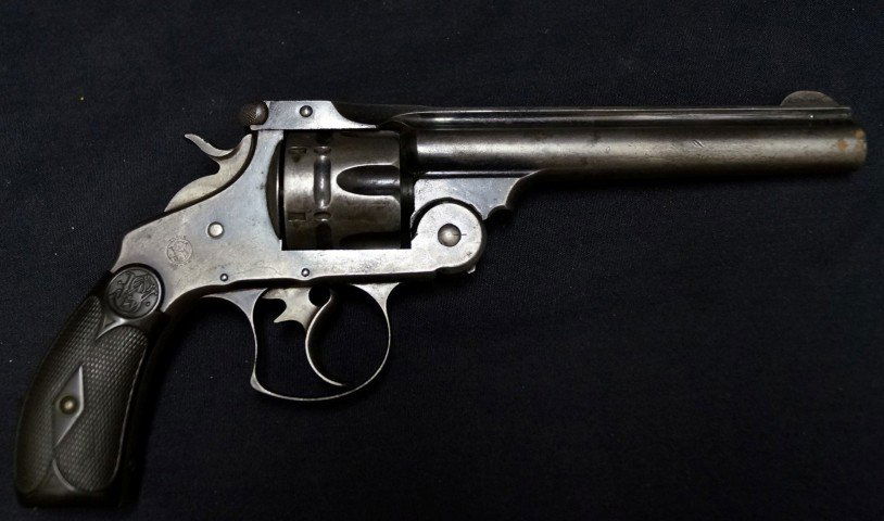 Smith and Wesson Revolver of C. E. Hoxsie: Engraved C. E. Hoxsie. Name marked at the top Smith and Wesson Springfield, Mass. With patent dates. Serial number at bottom of handle, 11" L.
