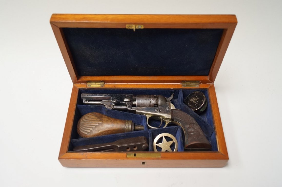 Colt Revolver Pistol in a Fitted Case: Colt 1849 pocket revolver. 4" barrel . All serial numbers matching. Presentation 31 caliber Colt pistol in a fitted case. Presented to John B. Jones by The Zion College in Winnsboro, S.C. for his elec
