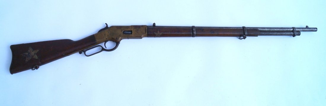 1866 Winchester Musket Third Model: Creek Police Gun. 27" barrel. Brass buttplate. Fore end cap missing. Hand forged brass five star mount on the stock and on the barrel
