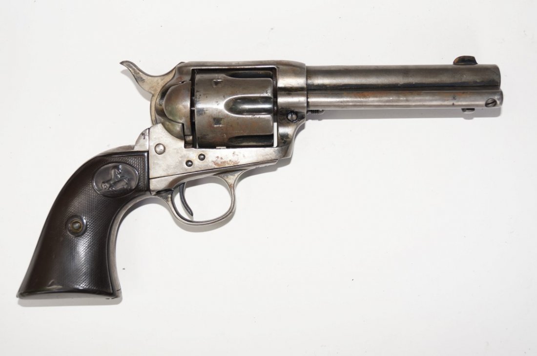 Colt Single Action Army Revolver: Early smokeless powder SAA. Hard rubber grips with rampant colt. Blued model. 41 Colt calibre. Marked Sam J. Hayhurst engraved in calligraphy on backstrap (Arizona Ranger) SN202.615