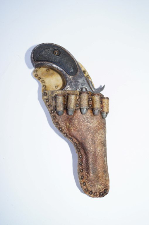 Remington "Smoot" 32 Calibre C. 1875: Of Cripple Creek Assay Office. Small note inside left grip: W. H. Abbott 2nd & Carr Cripple Creek. According to Cripple Creek Mining Museum, H. Abbott was the District Assayer in 1893-1894 . Probable 