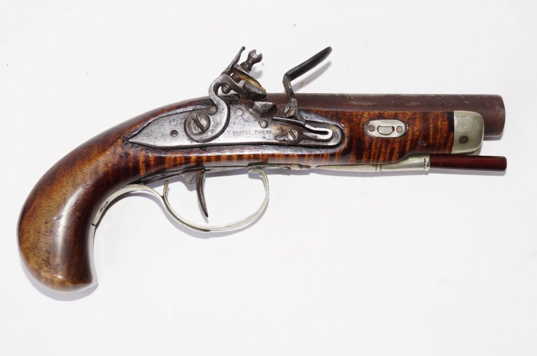 T Howell Phil. Pistol: With engravings. Striated wooden handle