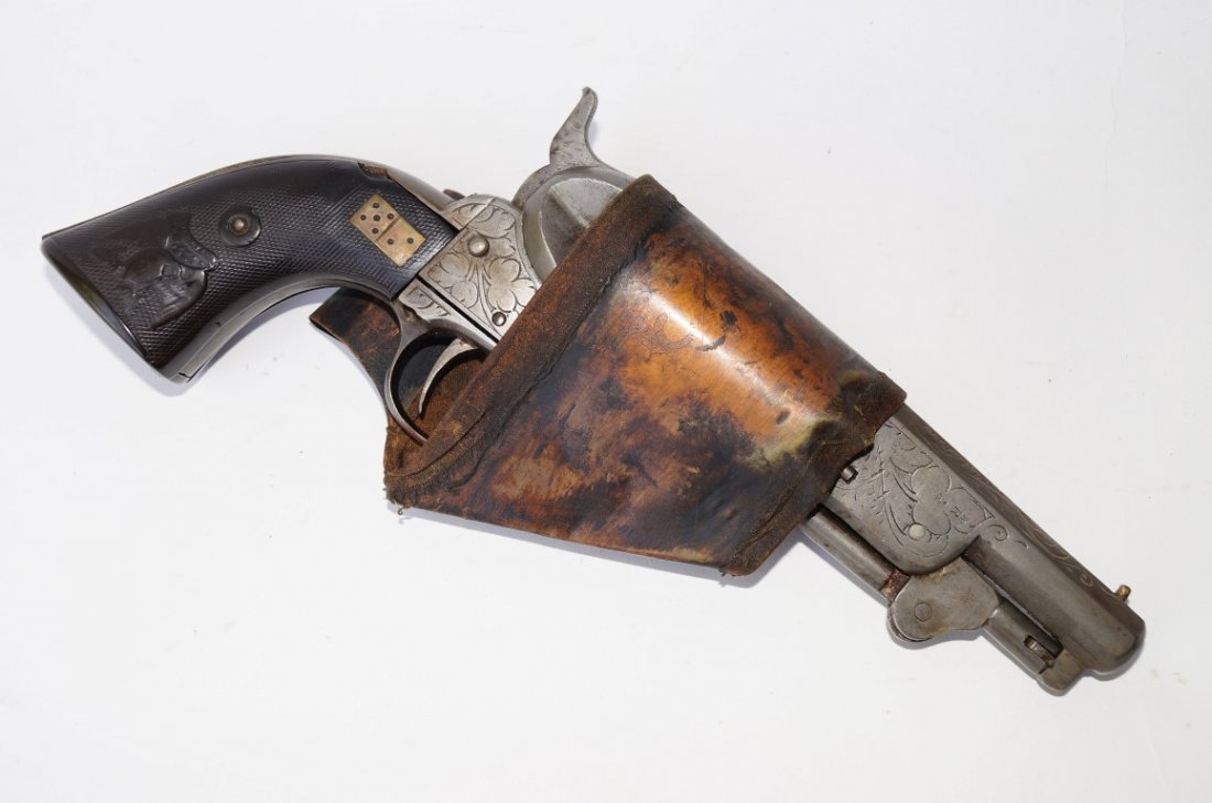 .45 Cap & Ball Gun With Copper Inlay: Floral engraved .45 Cap & Ball Gun with copper inlay and 1/2 holster. Inside grips marked " Govr Thomas Carnby" "Bob Kelsey-Abilene 1864 or 1869 Tom Carney was a well known Kansas gambler. No informat