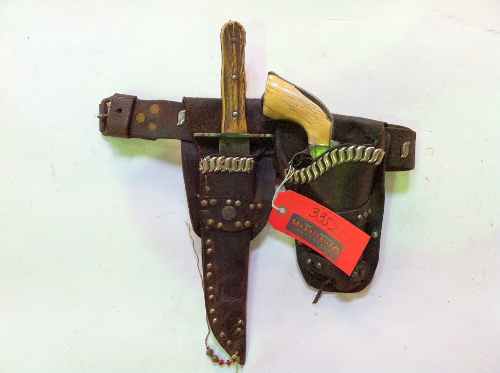 Colt 1860 Army Conversion Revolver: Richards conversion. 44 Colt centerfire. Cut down barrel. No ejector rod. Ivory grips. Lanyard ring. Holster with belt rig Knife, Bowie style with stag handle and nickel hilt.