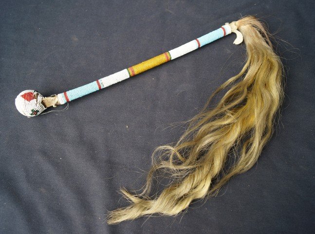 American Indian Weapon: Horsehair tail. Beadwork decorations and beadwork handle application. 16" L.