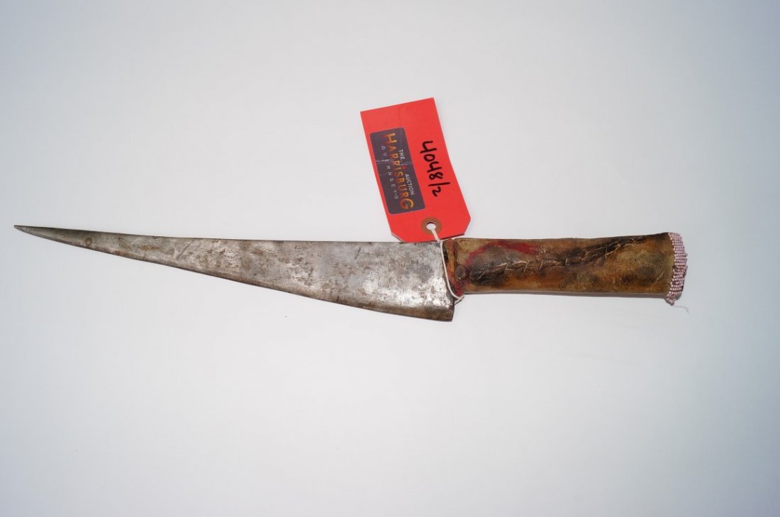 American Indian Lot (2): A beadwork and leather turtle figure; a dagger with bead decoration. 3 3/4" and 17" L.