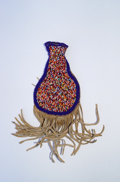 Navajo Beaded Corn Planting Bag: Beadwork on leather. 10" L with the fringe.