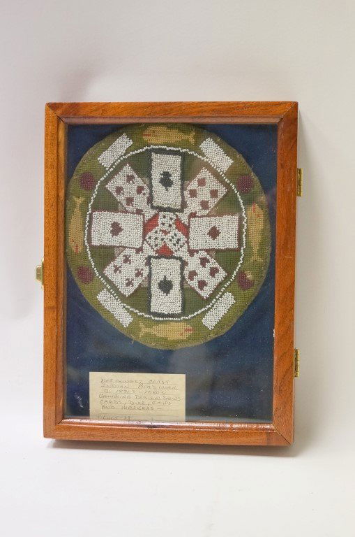 Northwest Coast Indian Beadwork - Gambling: 1870's - 1880's Northwest Coast Indian beadwork with gambling designs including cards in all four suits, three dice, chips and markers in a circular motif. Needlework fish surround the design. In an w