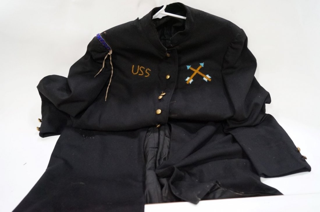 U.S.S. Wool Coat With Eagle: Wool with beadwork eagle at the back. Marked USS at the front beadwork with beadwork crossed swords. Gold buttons with eagle and shield decorations. Back of the buttons marked New York C.Kenyon Co.