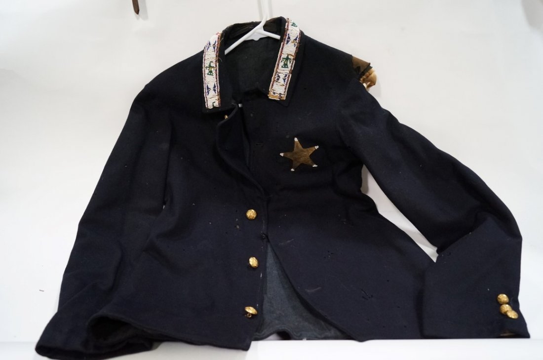 Lakota Police Jacket: With beadwork. Same buttons as previous lots, these marked Horstmann As is condition. Would need restoration