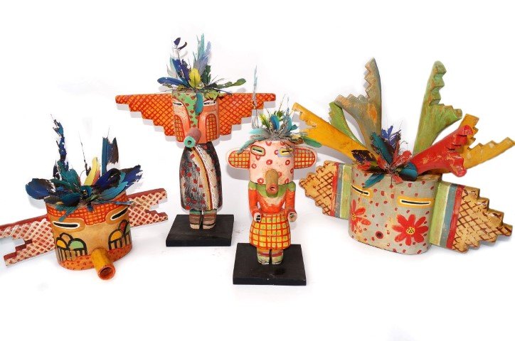 Contemporary Indian Sculpures Greg Lomayesa (4): Hand painted wood, feather decorations . Al can be wall hung. 15"W. x 14 3/4"H; 7 3/4"W. x 11 7/8"H.; 20 1/2"W. X 17 3/4"H and 14 1/2"W. x 6"H