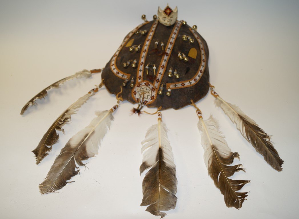 Ceremonial Turtle Shield: Ceremonical turtle honoring shield. The turtle represents wisdom, protection, good health. Made from snapper shell & skull, antler disc, deer skin, hand painted eagle feathers, pheasant feathers, hawk