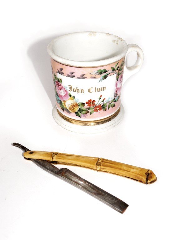 John Clum's Shaving Mug and Razor: Razor by W.H. Morley & Co. Clover Brand Germany. 9 1/2" (razor opened) 3 1/2" H (mug).
