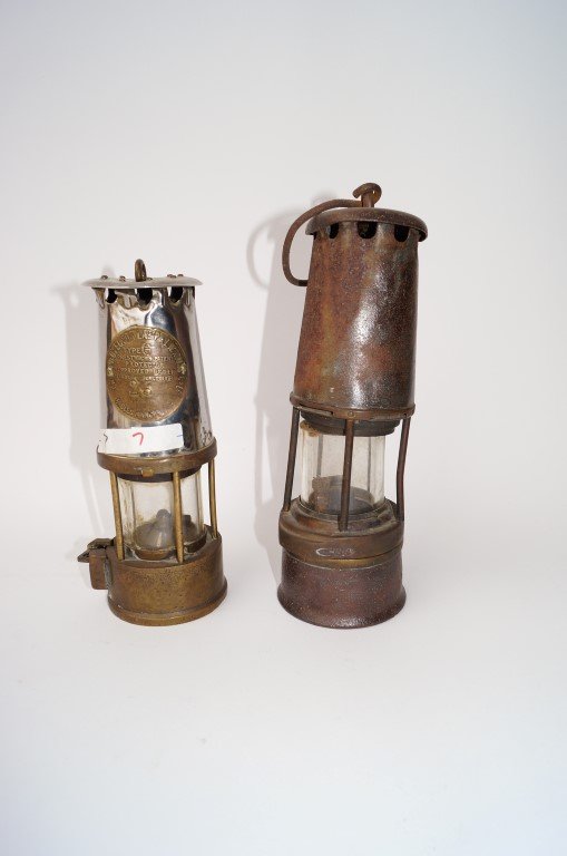 Brass Mining Lamp & a second: Safety Lamp. Protector Lamp and Lighting Co. Included in the lot is a second miner's lamp, probably earlier. 9" & 10".